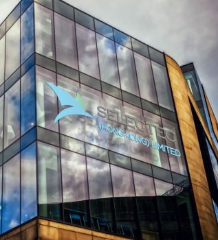 Selectec logo Building